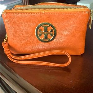 Tory Burch wristlet well loved and used